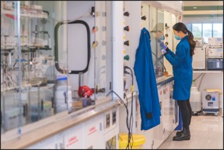 A scientist working in a lab.